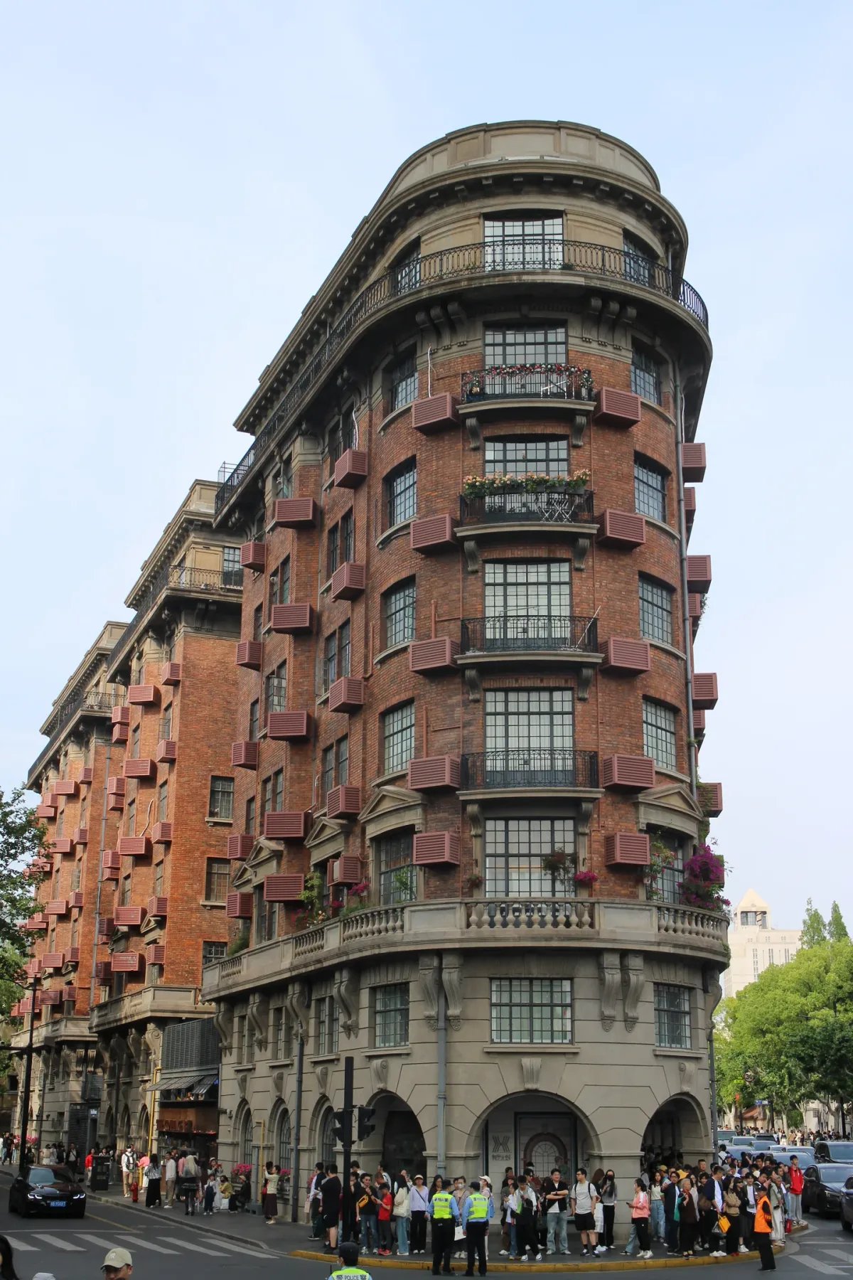 The curved brick facade of Wukang Mansion in Shanghai
